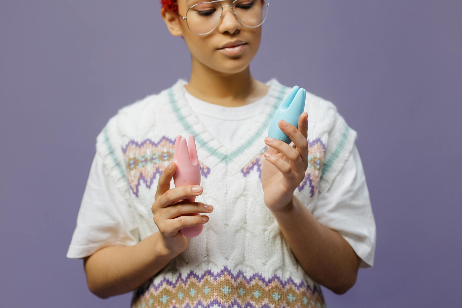 Woman holding a lemon vibrator in contemplation during recovery.